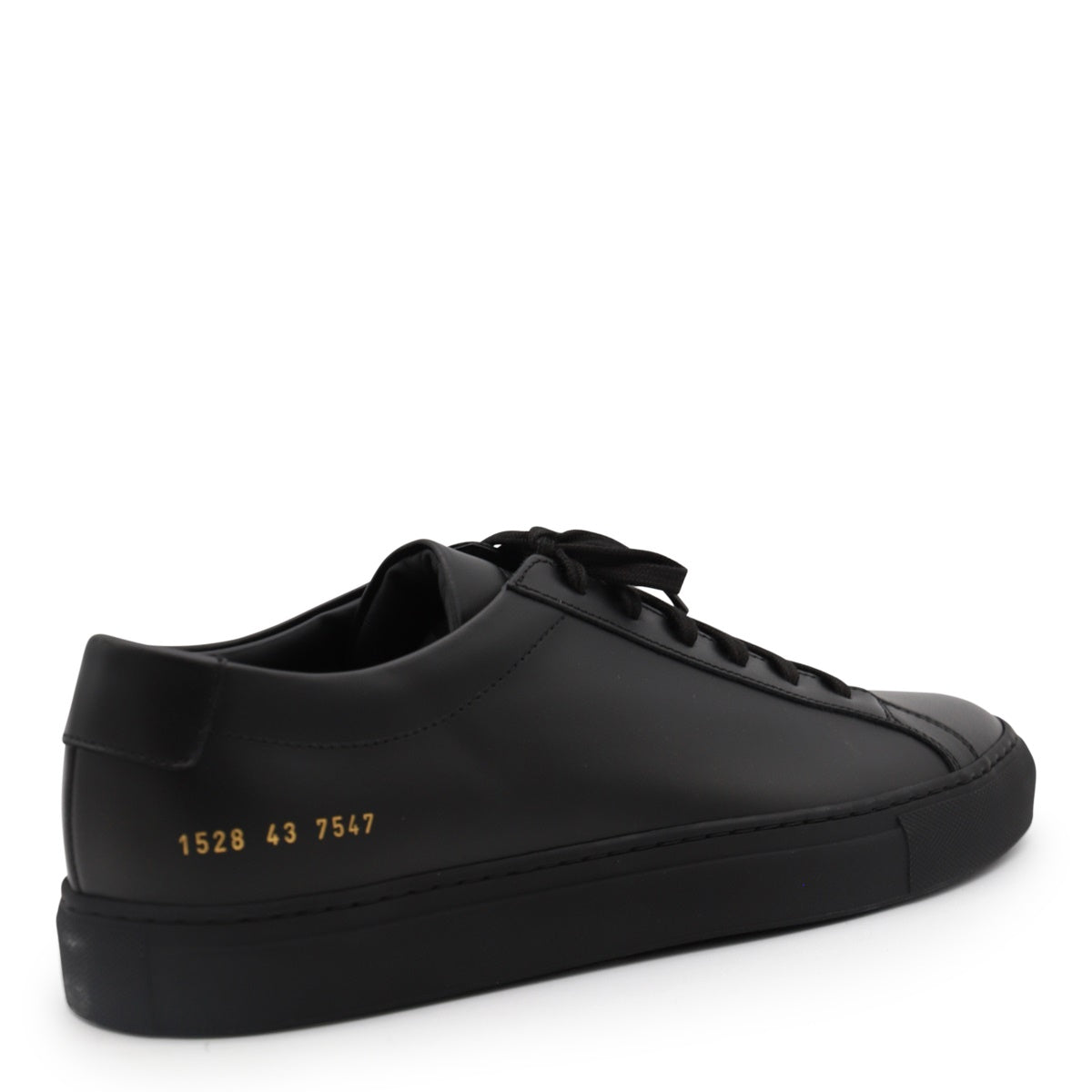 Minimalist Black Leather Sneakers With Gold Detailing