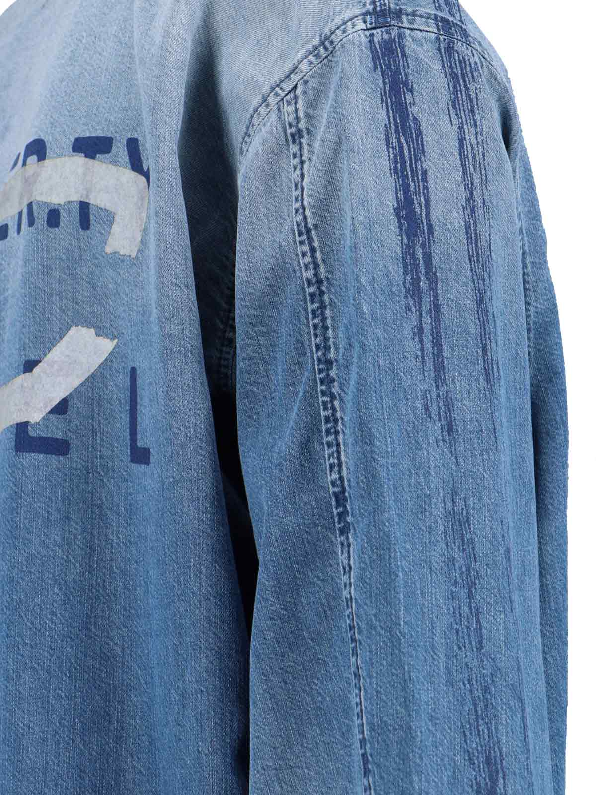 Denim Shirt With V-Neckline And Bold Back Graphic