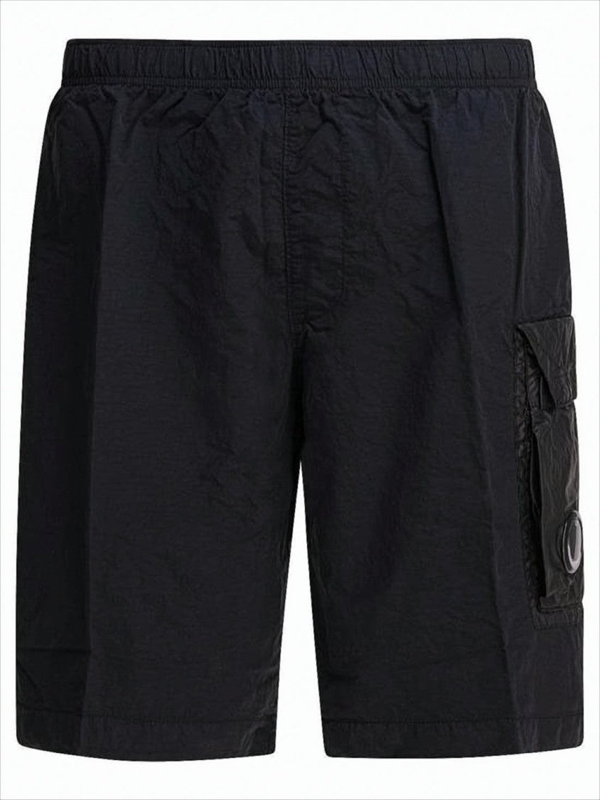 Black Minimalist Beach Shorts with Unique Lens Detail