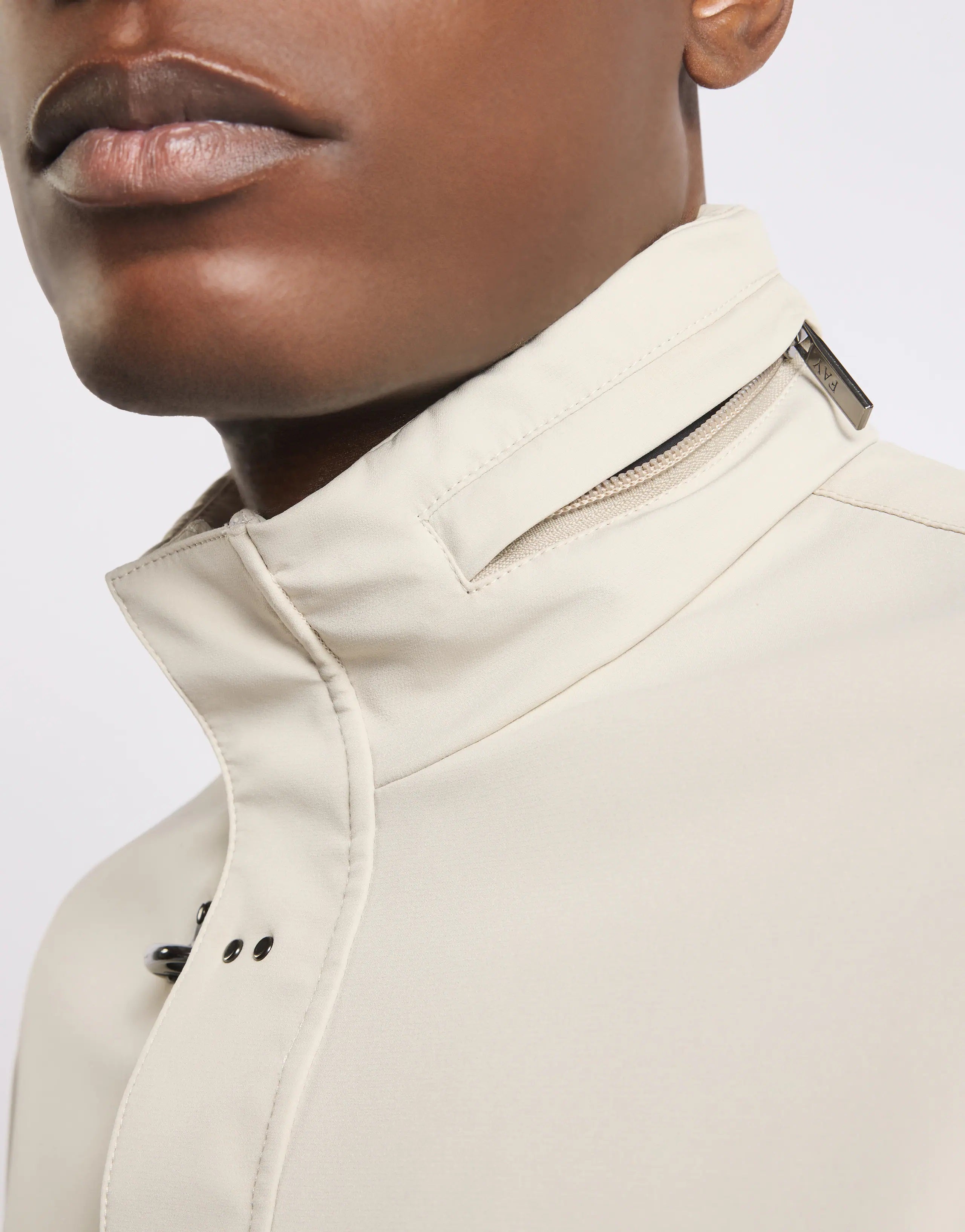 Tailored High-Collar Travel Jacket with Concealed Closure