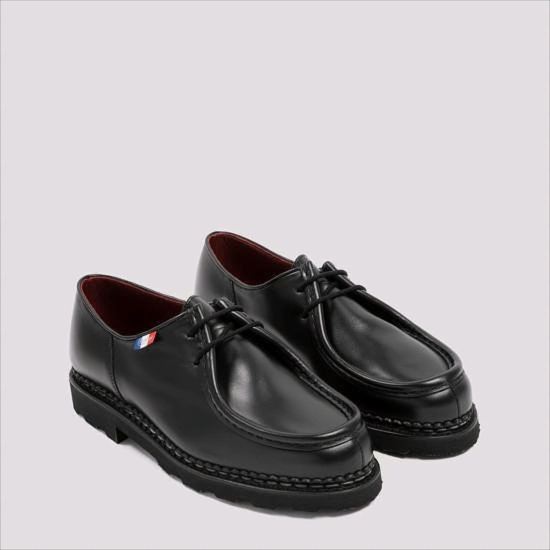 Black Leather Loafers with Moc Toe Design