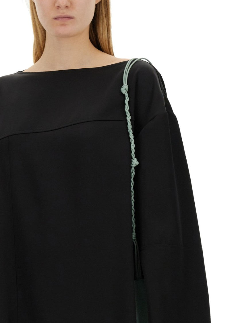 Asymmetrical Black Top With Unique Silhouette