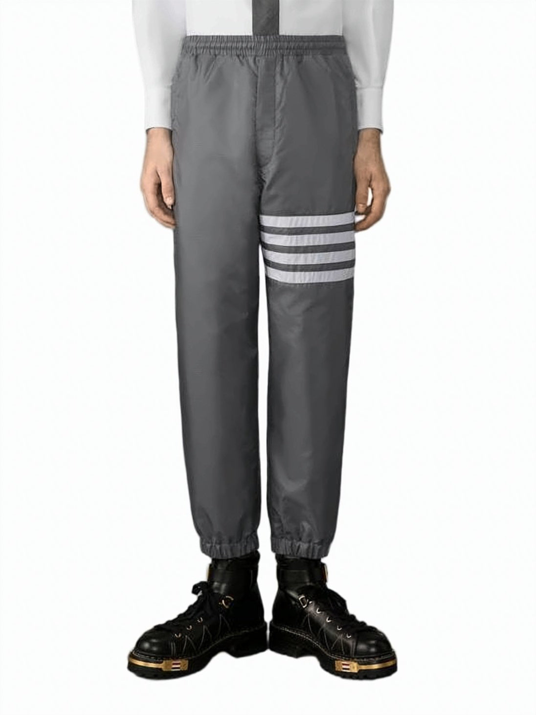Shiny Ripstop Track Pants With Four Stripes