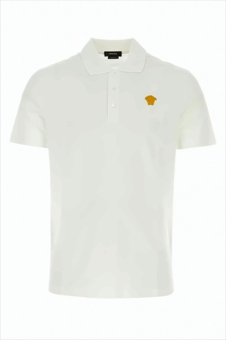 White Polo Shirt with Traditional Collar and Embroidered Emblem