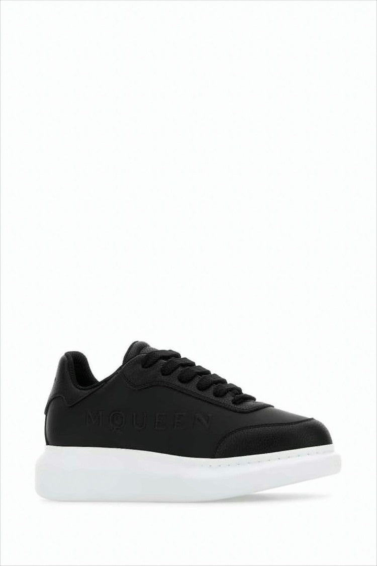 Low-Top Black Leather Sneakers with Contrasting White Sole