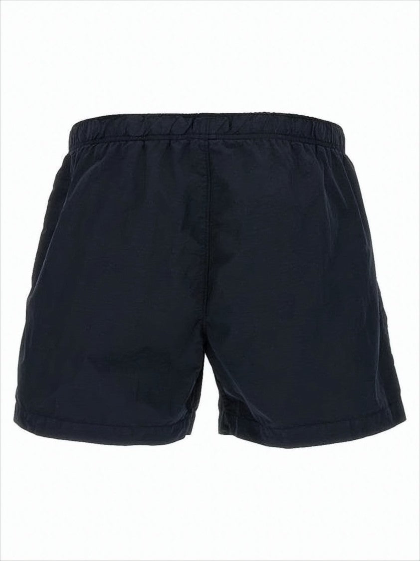 Minimalist Blue Swim Shorts with Distinctive Lens Detail
