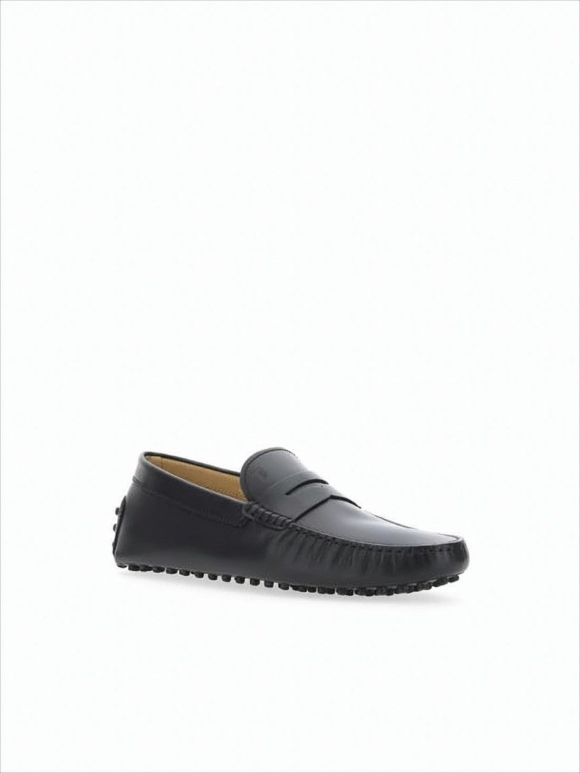 Refined Black Leather Loafers with Penny Strap and Moccasin Stitching