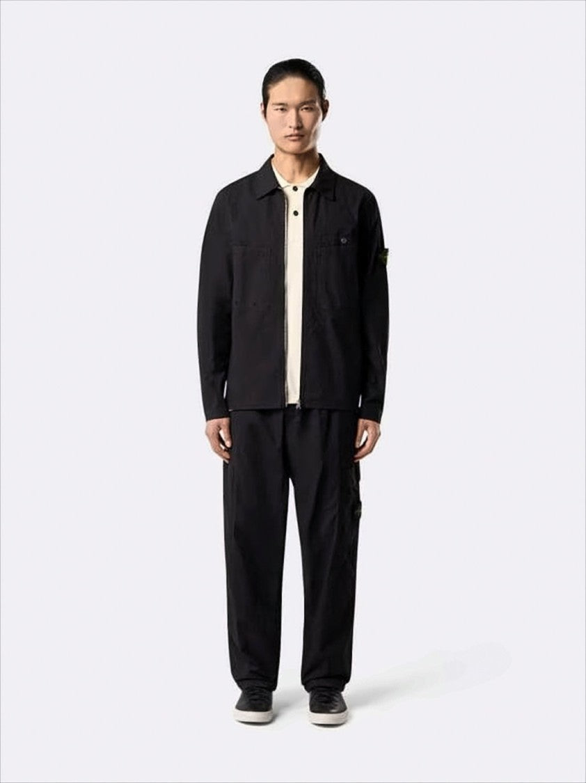Black Jacket with Classic Collar and Distinctive Patch