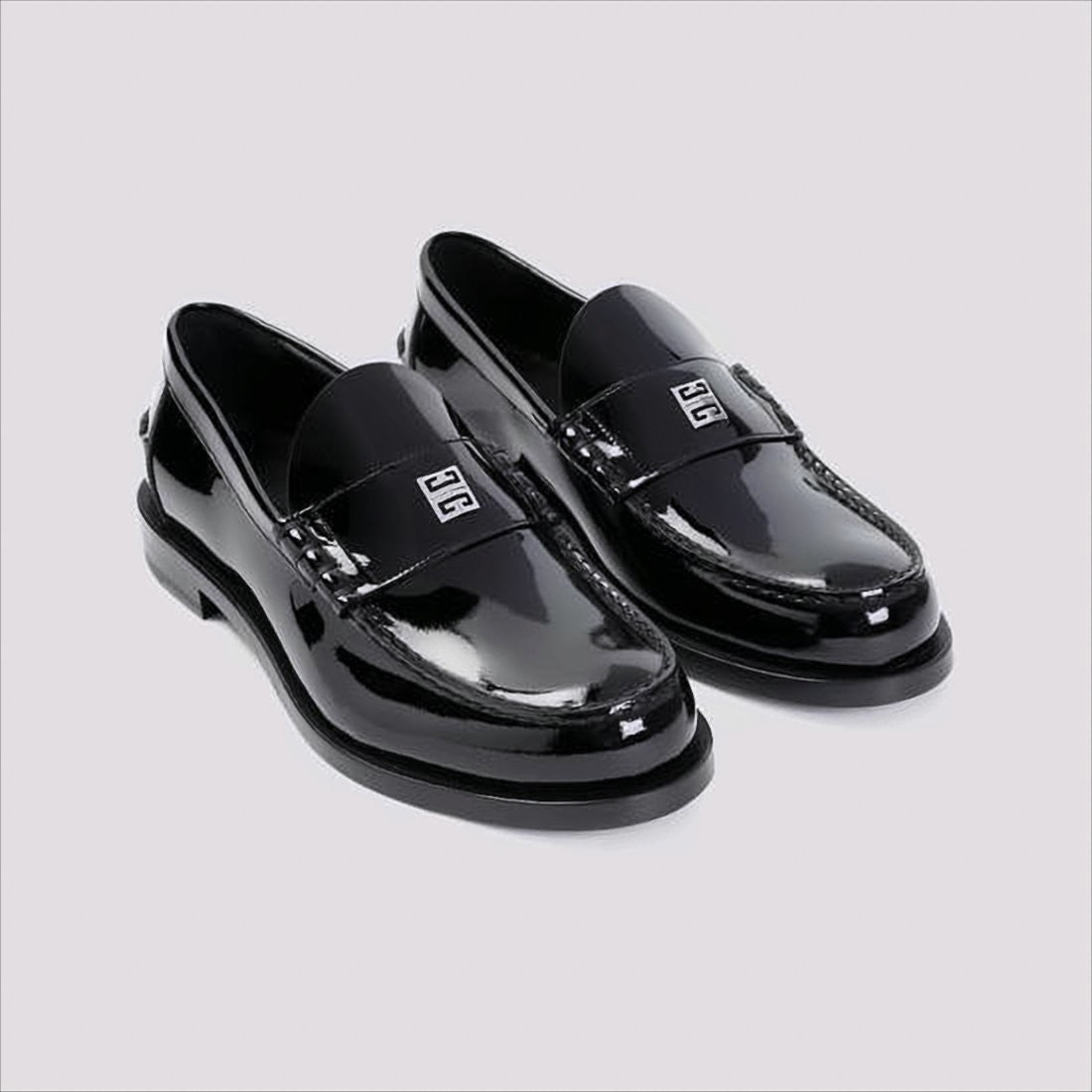 Glossy Black Moc Toe Loafers with Metallic Details