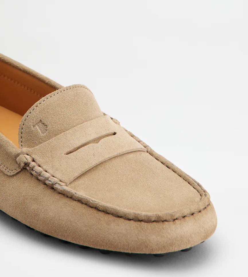 Classic Brown Leather Moccasins With Distinctive Detailing