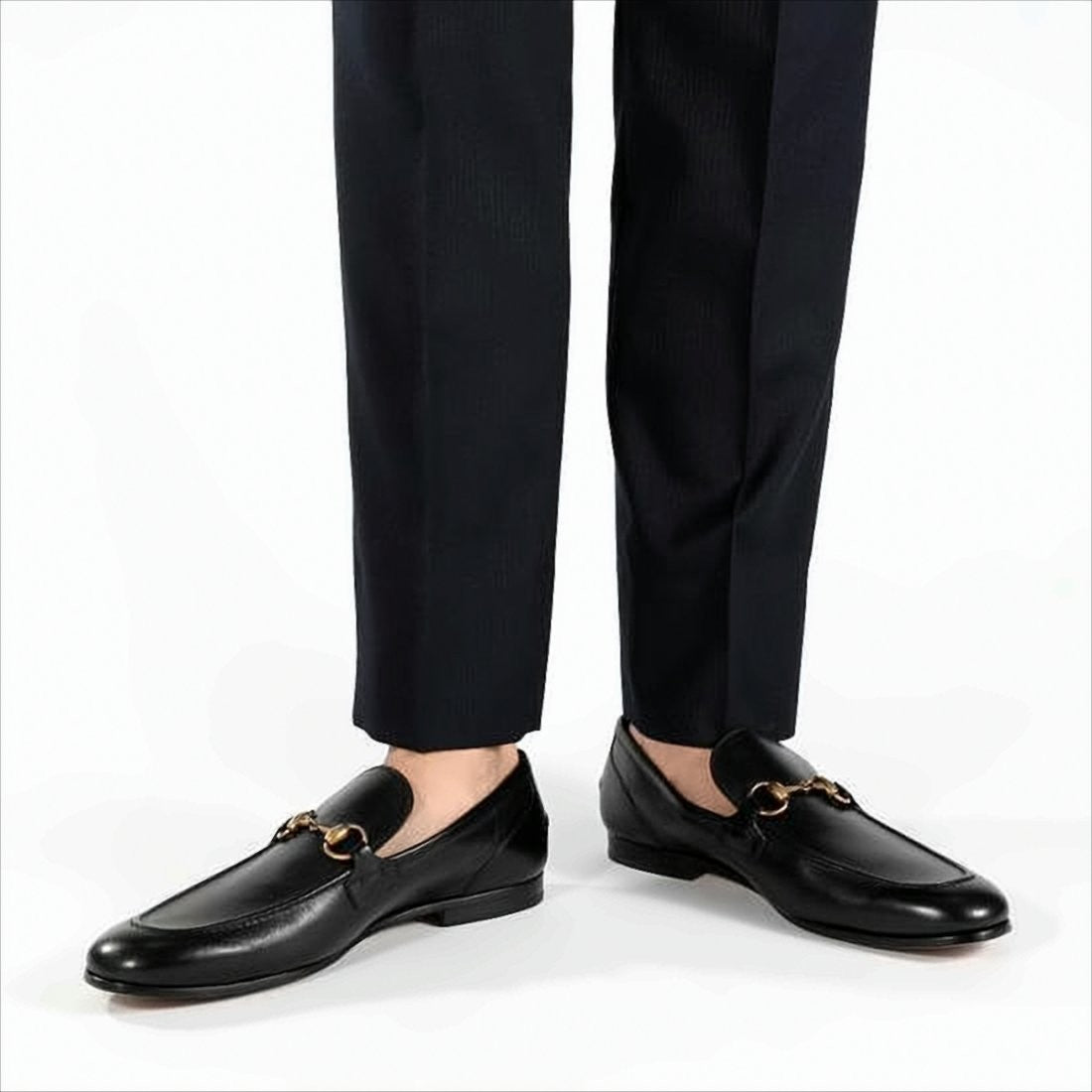 Black Leather Loafers with Gold Horsebit Detail