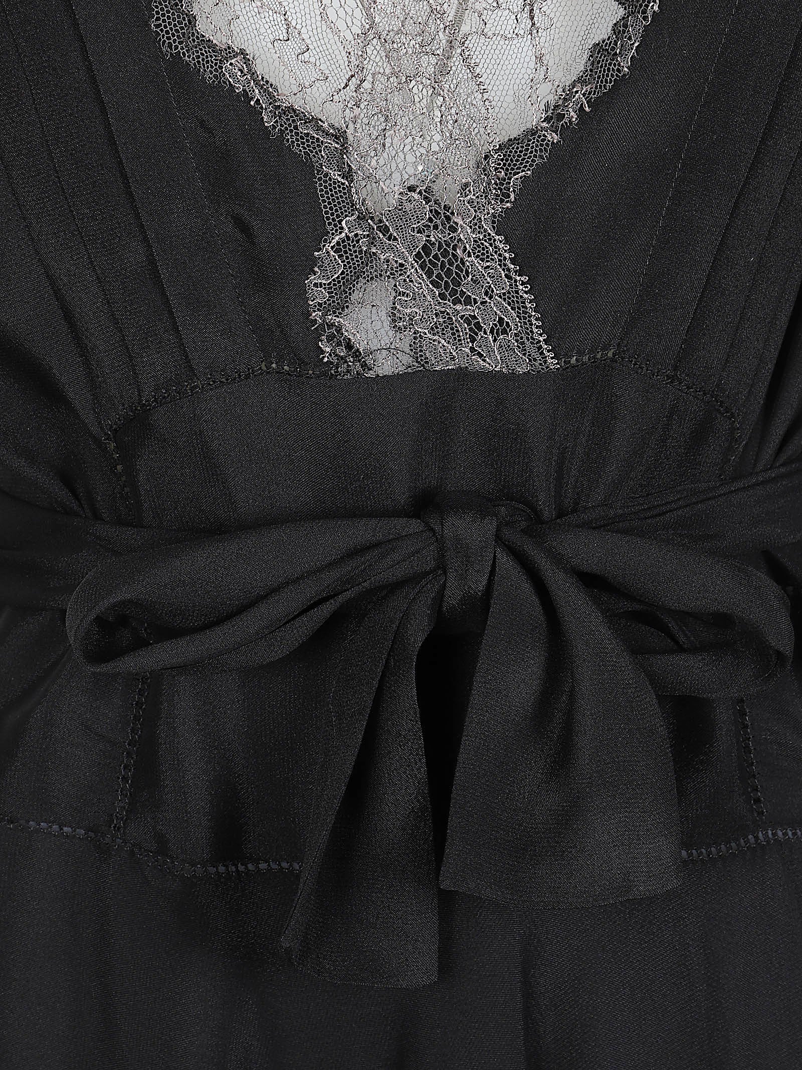 Flowing Black Dress with Lace Trim and Belted Waist