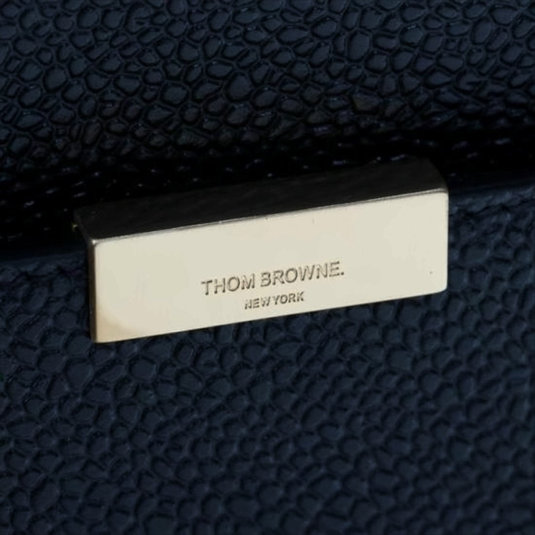 Textured Leather Clutch with Gold-Zipper Closure and Tricolor Accents