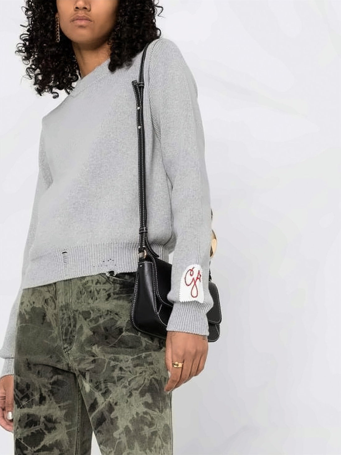 Ribbed Knit Sweater with Distressed Details