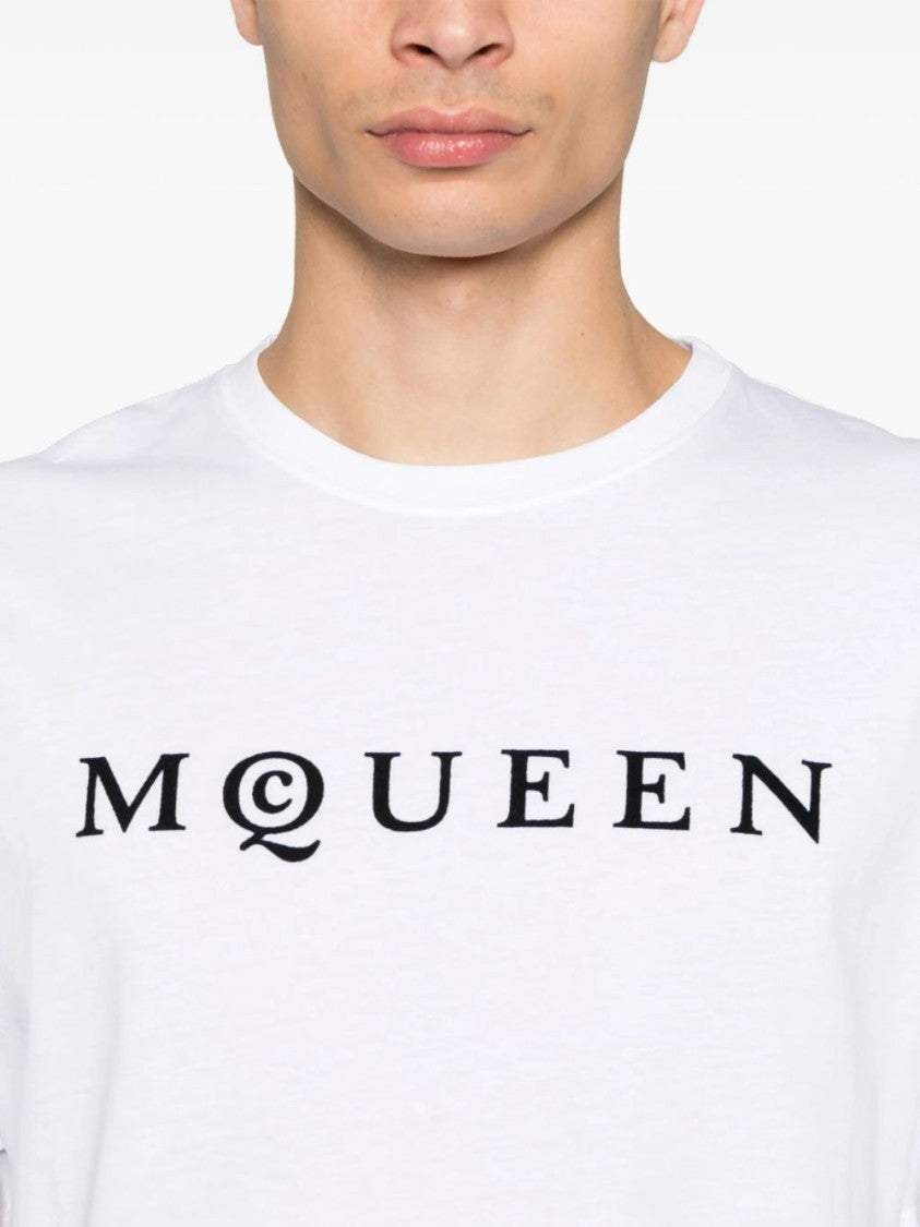 White T-Shirt with Bold Black Lettering
