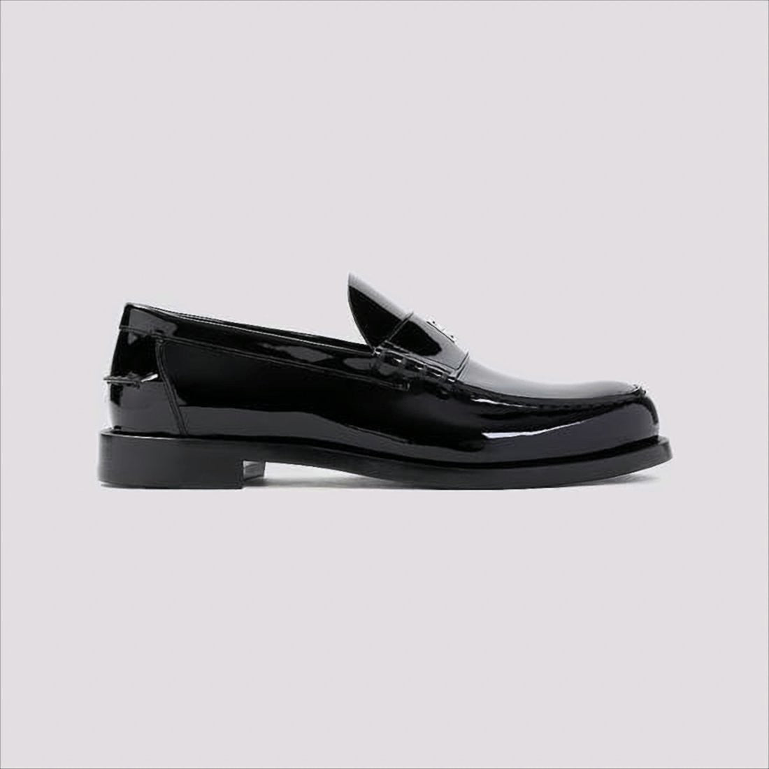 Glossy Black Moc Toe Loafers with Metallic Details