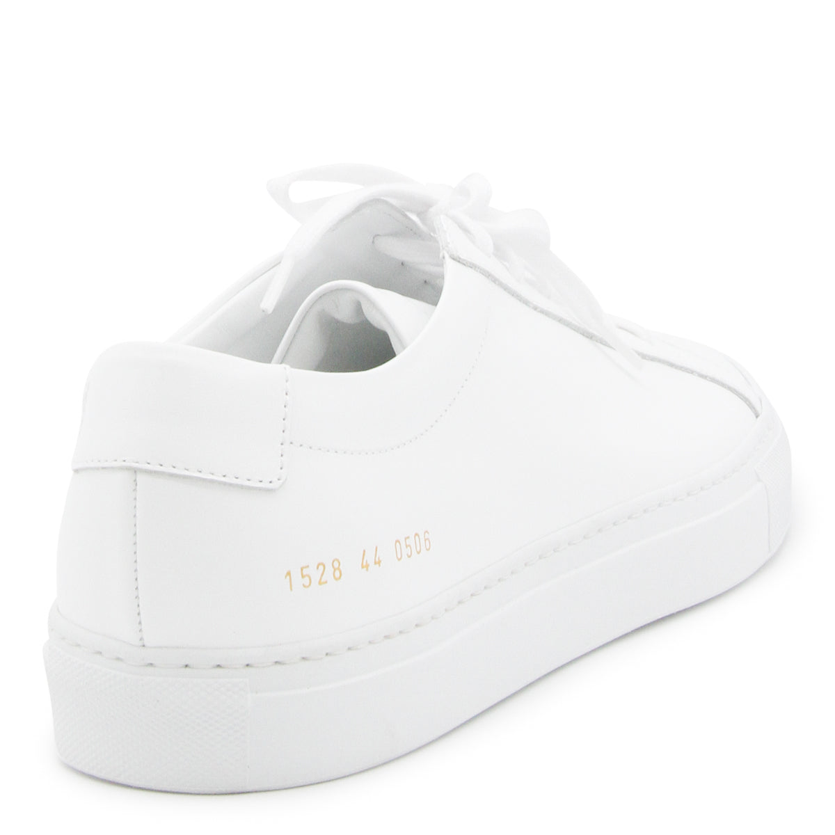 Minimalist White Leather Sneakers With Refined Gold Detail