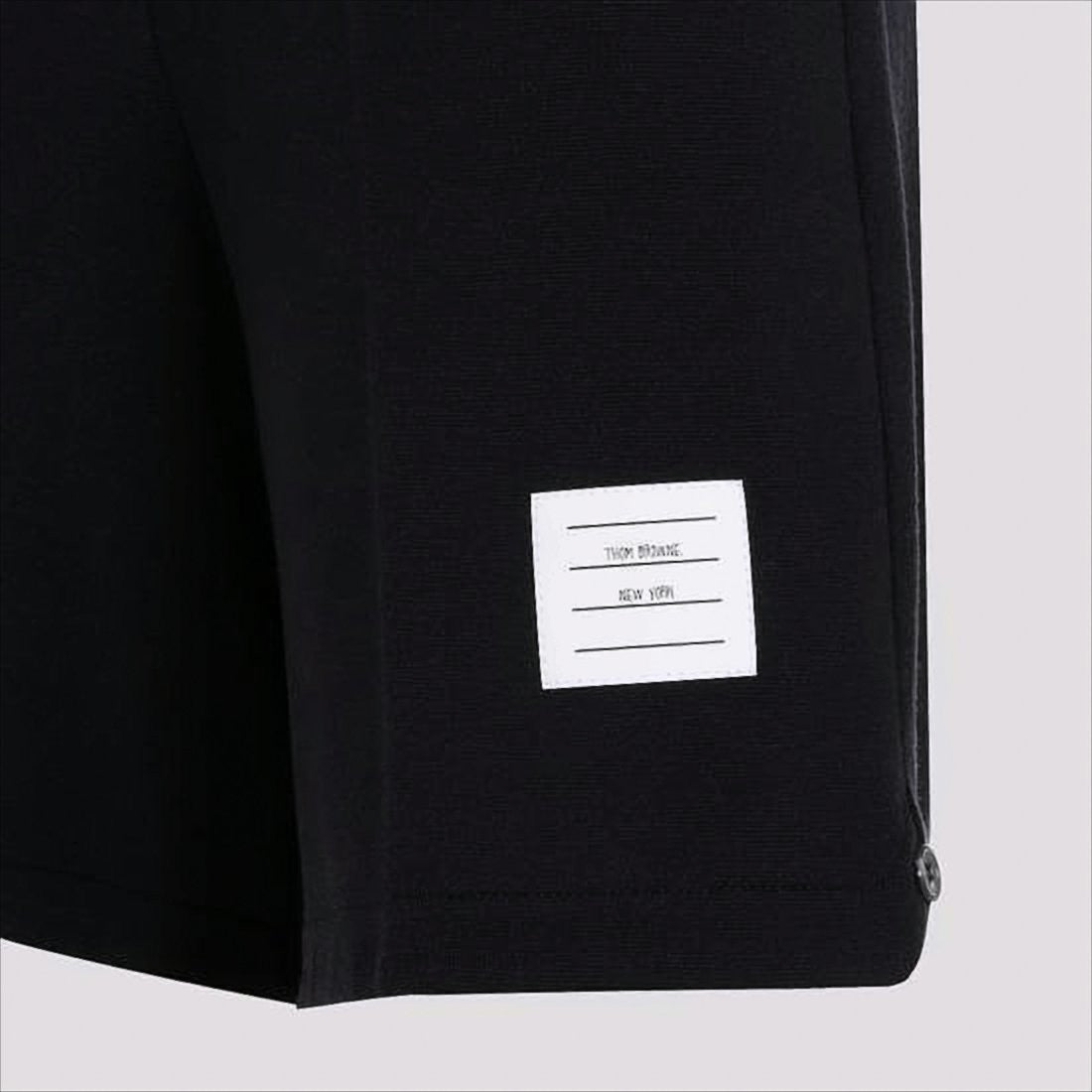 Tailored Black Shorts with Clean Silhouette and Subtle Patch