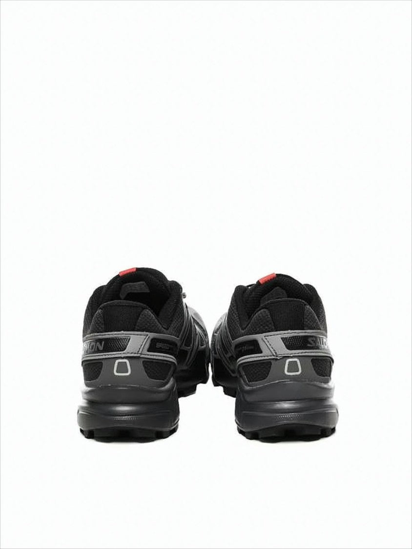Athletic Sneakers with Streamlined Silhouette and Unique Overlays