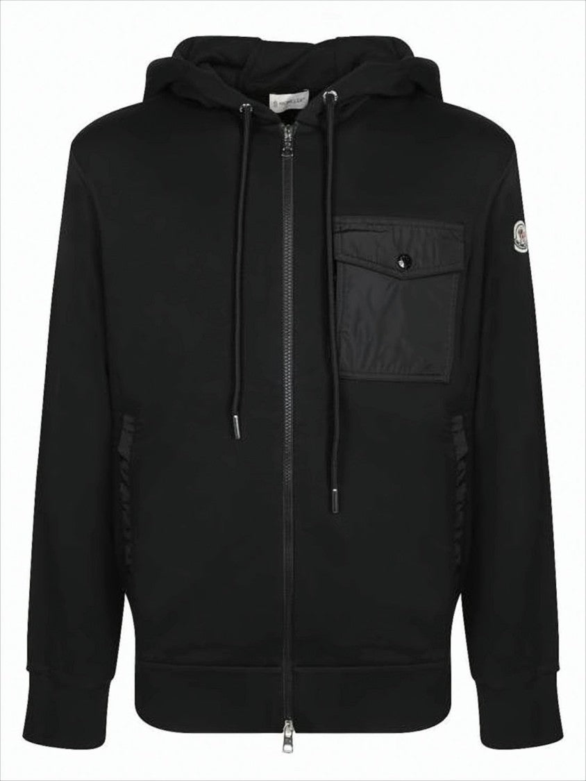 Minimalist Black Hoodie with Distinctive Chest Pocket