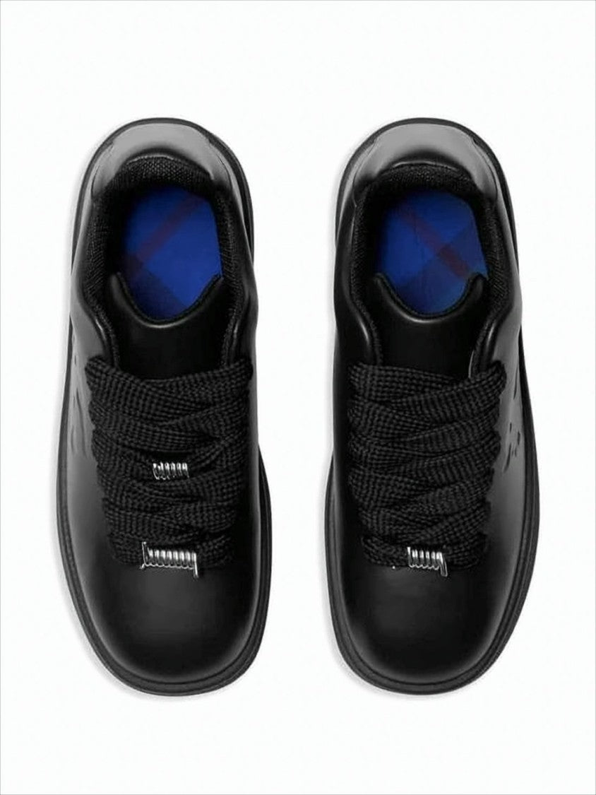 Monochromatic Black Leather Sneakers