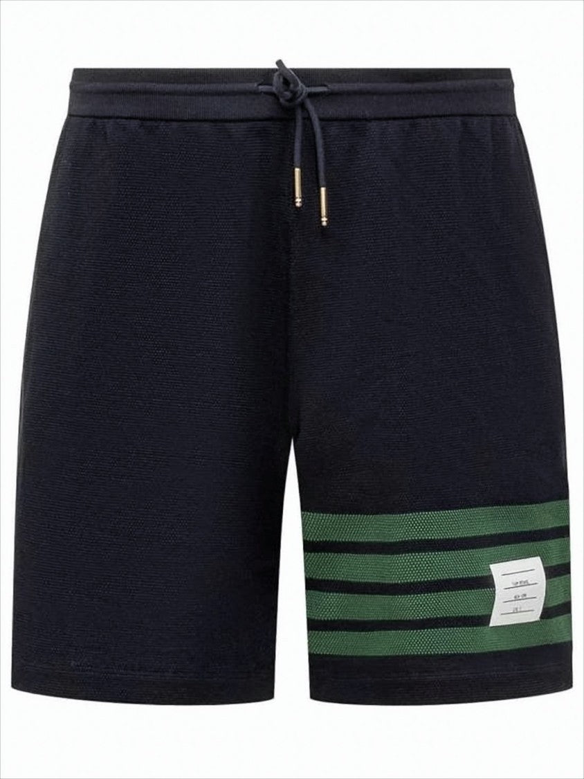 Tailored Black Shorts with Distinctive Green Stripe Detail