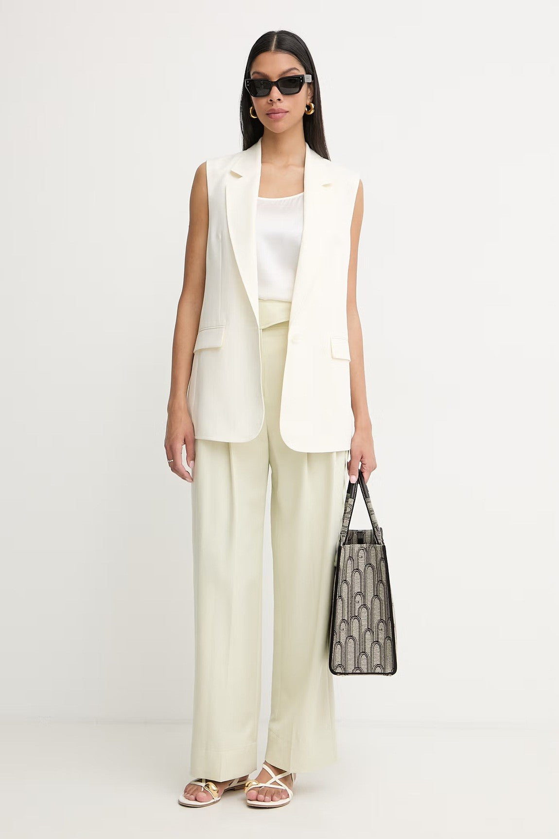 Silky White Sleeveless Top with Classic Scoop Neckline