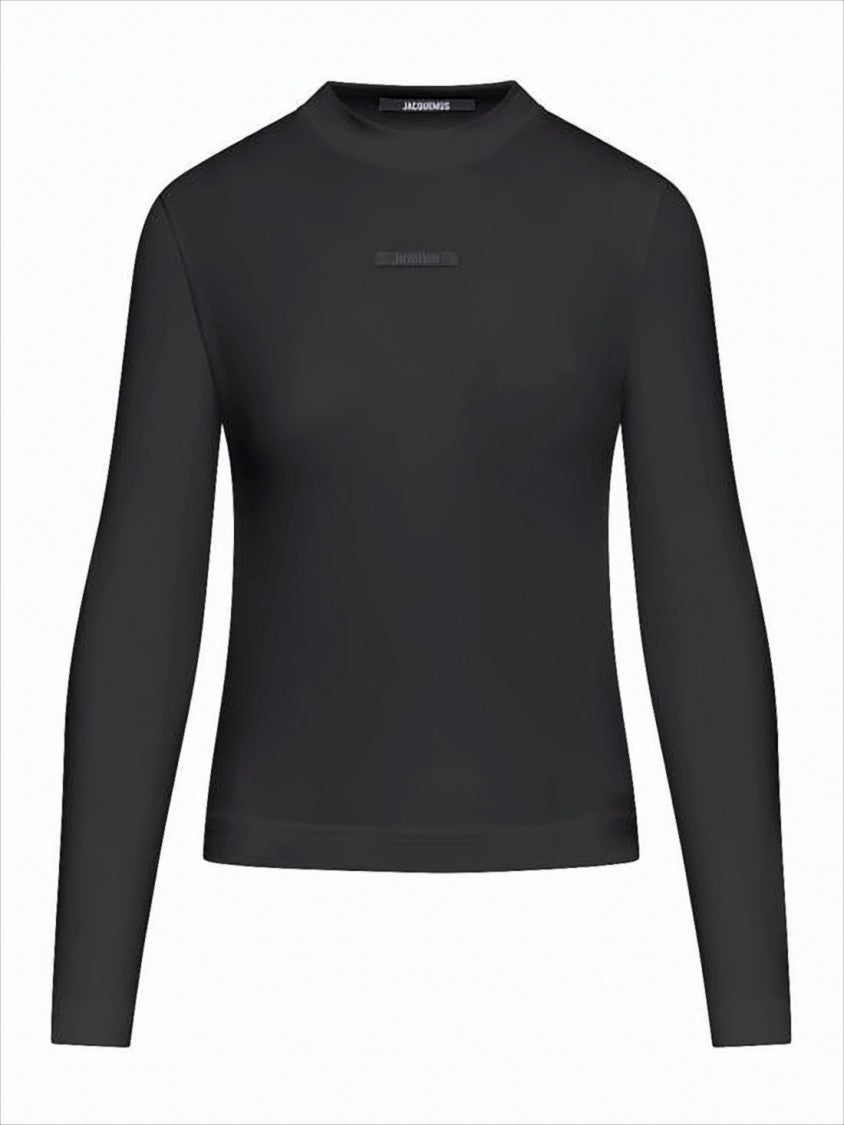Fitted Black Long-Sleeve Top with Subtle Logo Detail