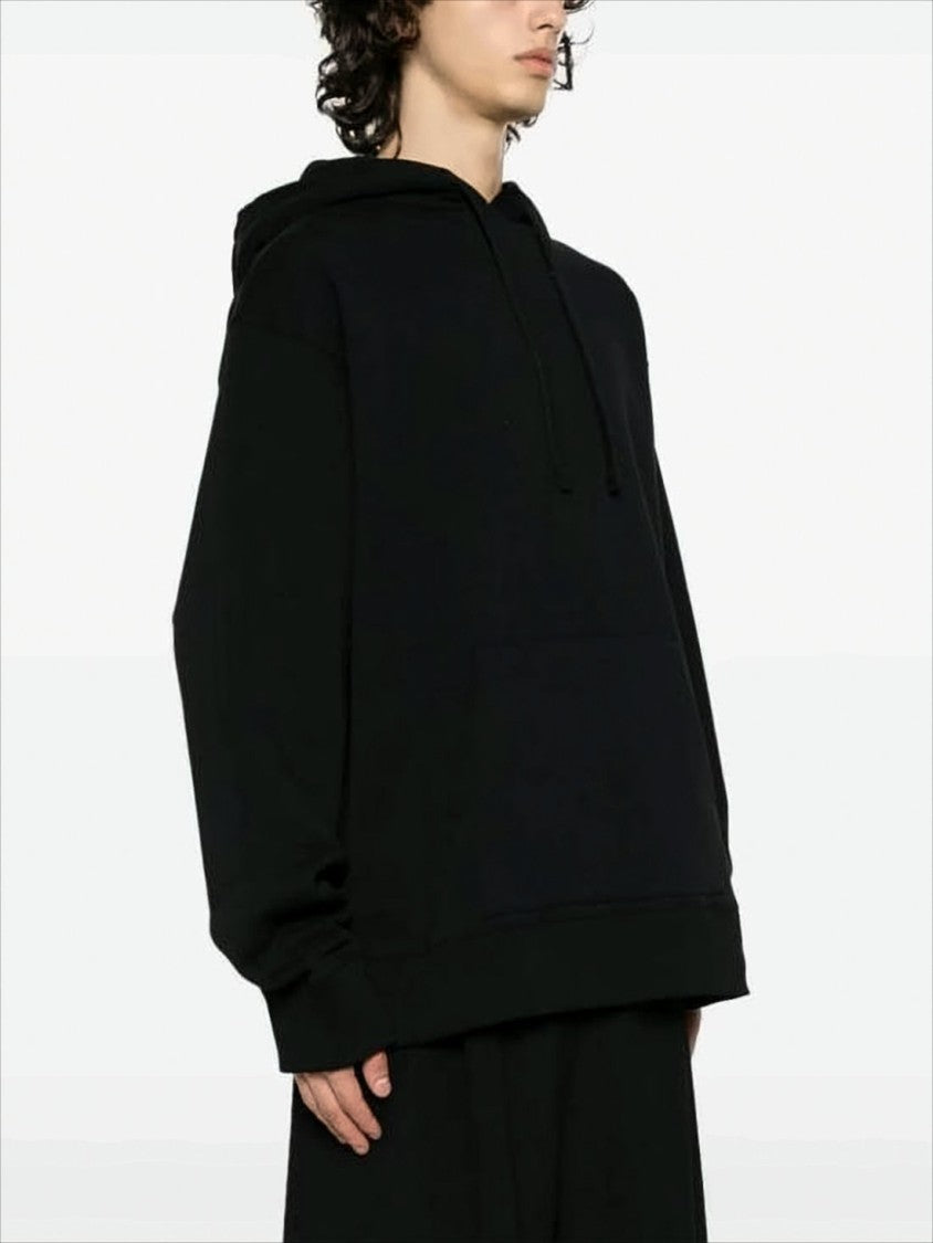 Relaxed-Fit Black Hoodie with Circular Graphic Design