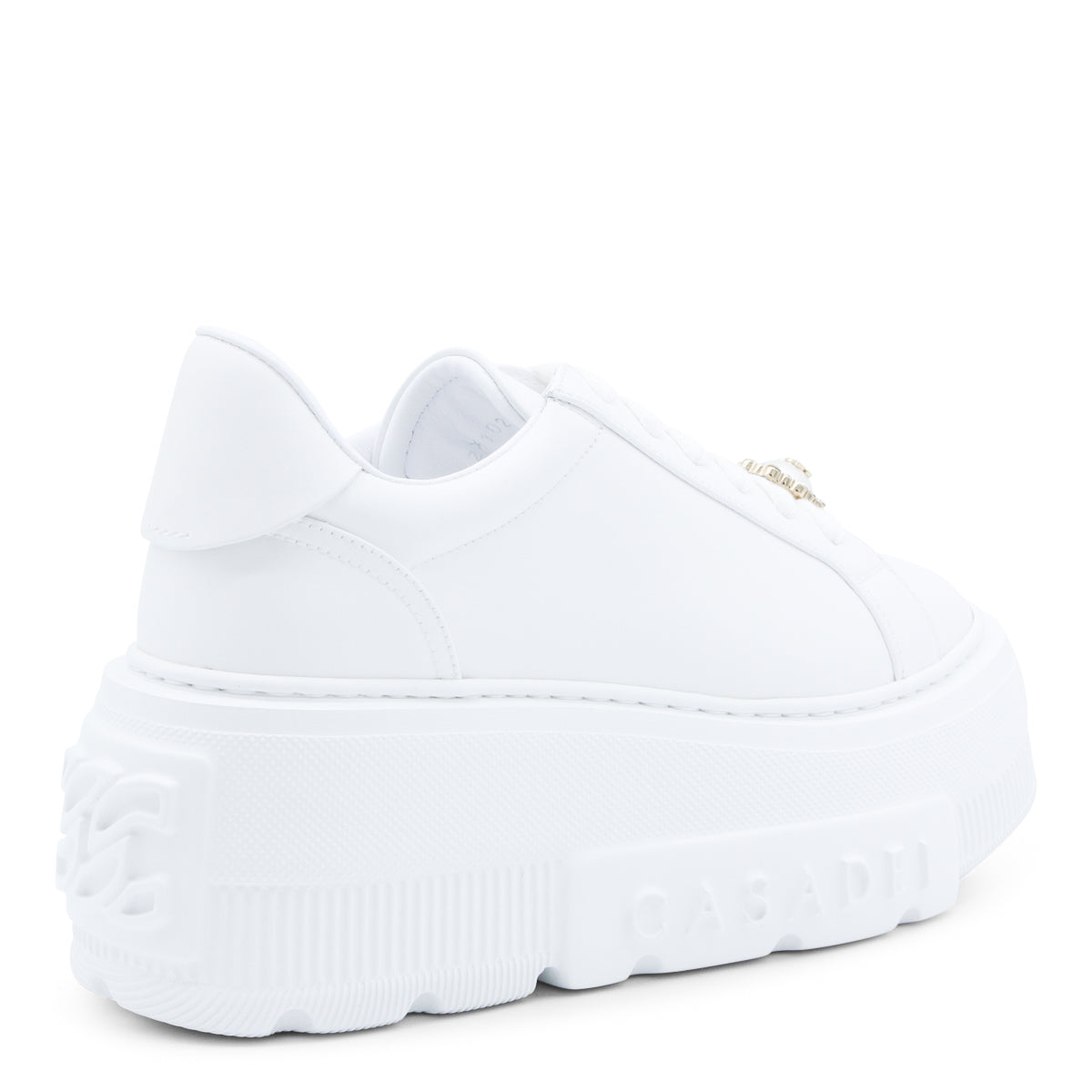 Minimalistyczne białe sneakersy z gładką cholewką