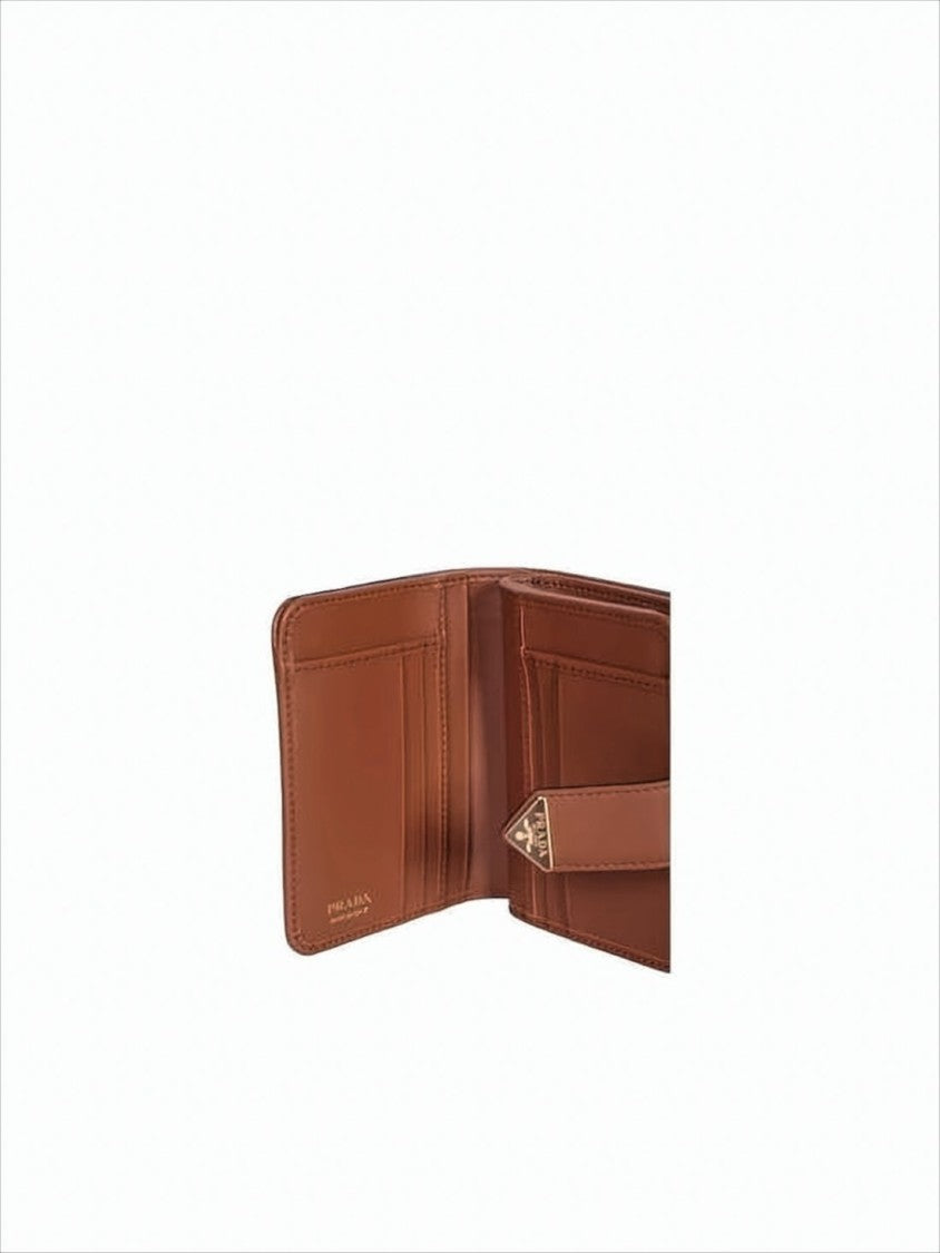 Compact Brown Flap Wallet with Triangular Metal Accent