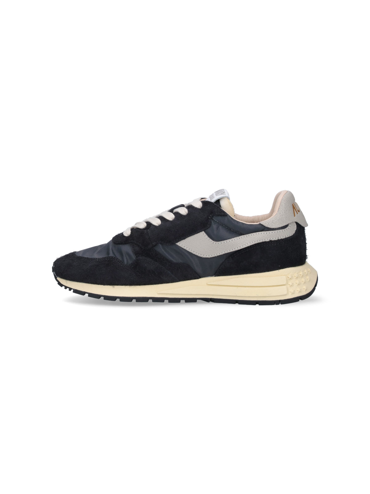 Streamlined Black Sneakers With Minimalist Design