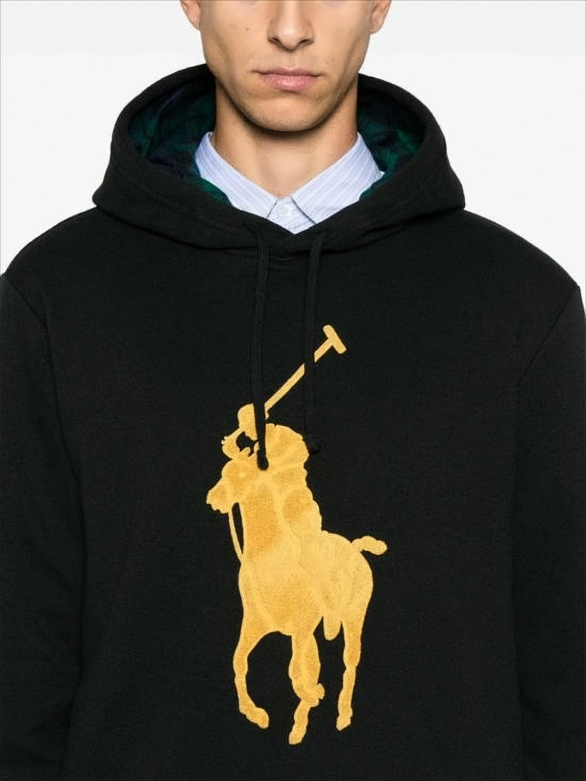 Black Hoodie with Bold Yellow Polo Graphic and Plaid Lining
