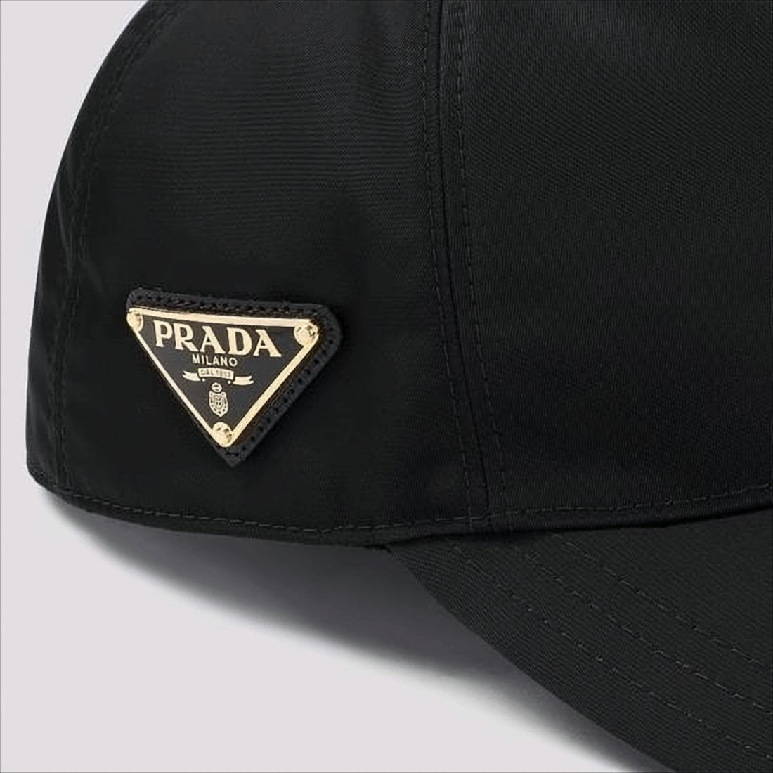 Structured Black Cap With Triangular Metal Logo