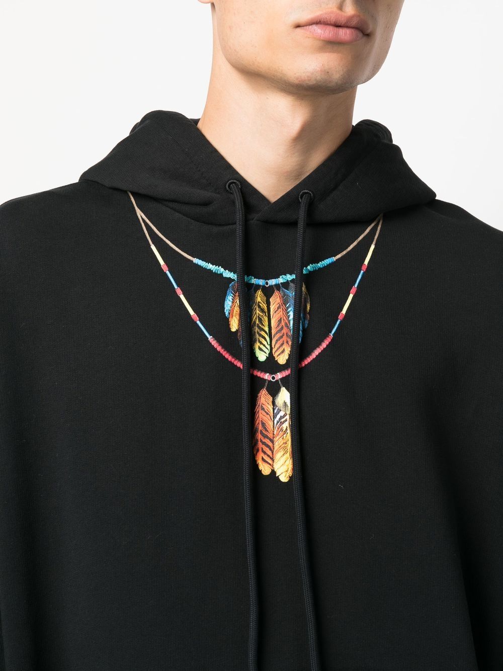 Black Feathers Necklace Over Cotton Hoodie