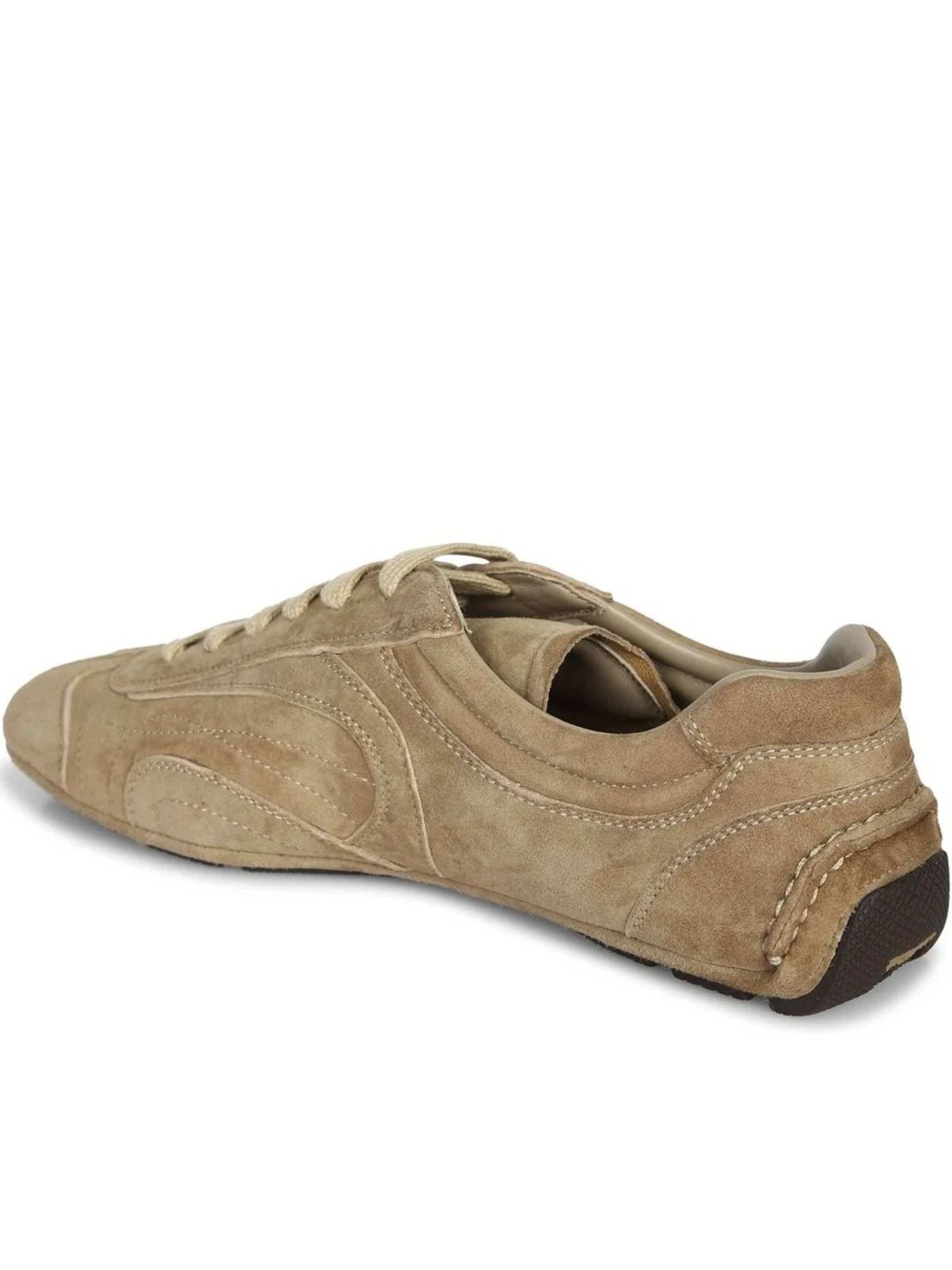 Low-Profile Brown Suede Sneakers with Intricate Stitching