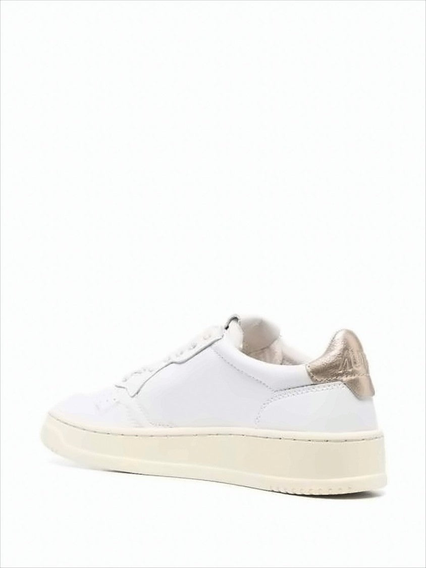 Smooth White Leather Low-Top Sneakers with Metallic Accents