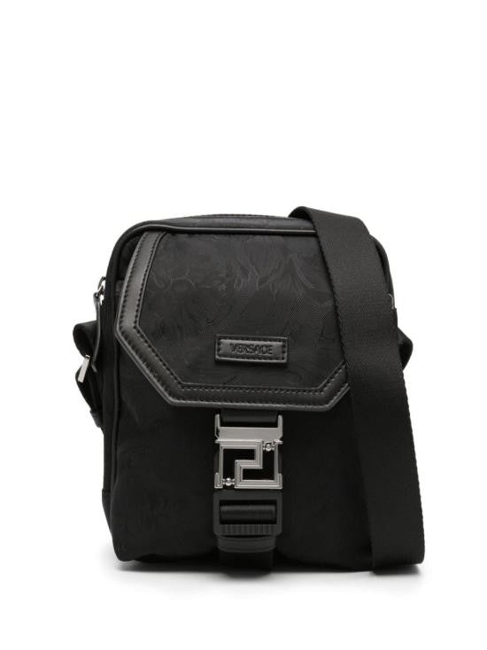 Structured Black Crossbody Bag with Flap Closure and Metallic Detail