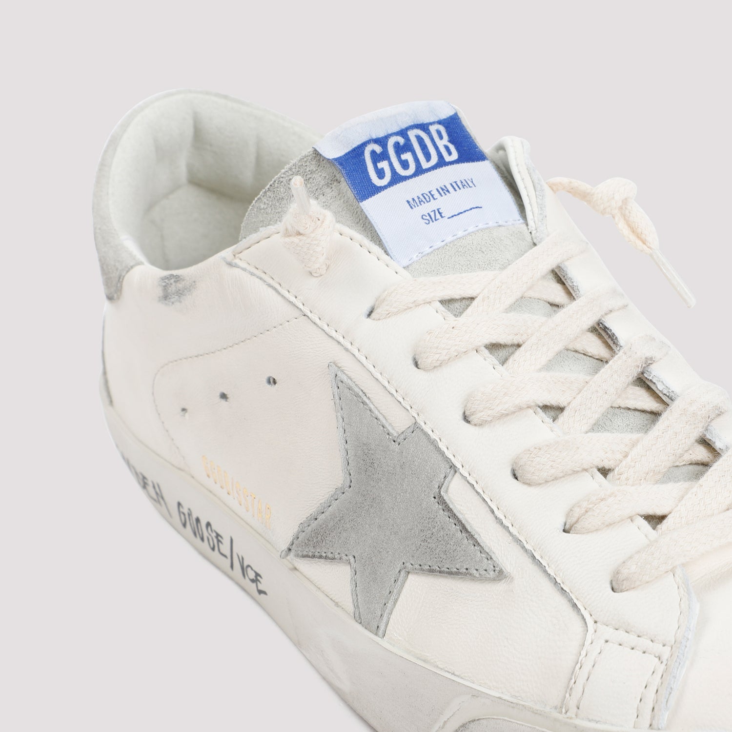 Distressed White Leather Superstar Sneakers