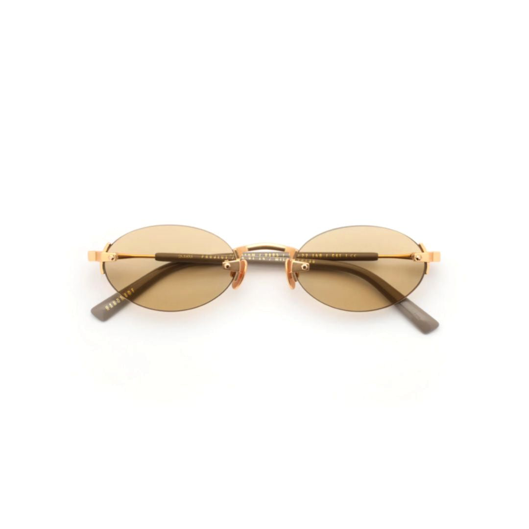 Quantum Oval-shaped Sunglasses with Gold Finish and Minimalist Design