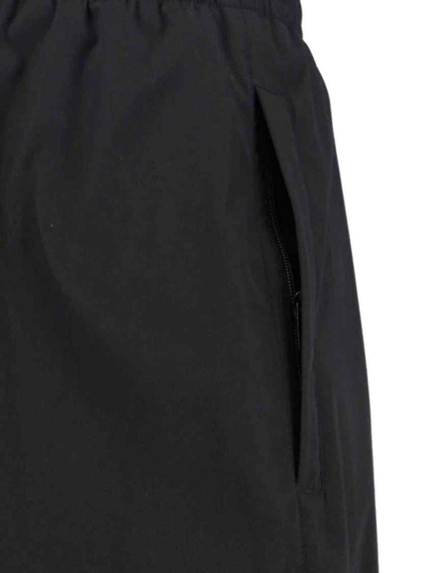 Wide-Leg Trousers With Zippered Pockets