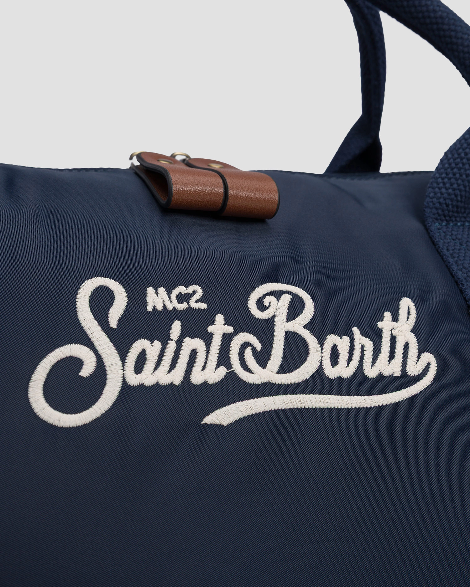 Navy Blue Duffle Bag with Brown Leather Accents