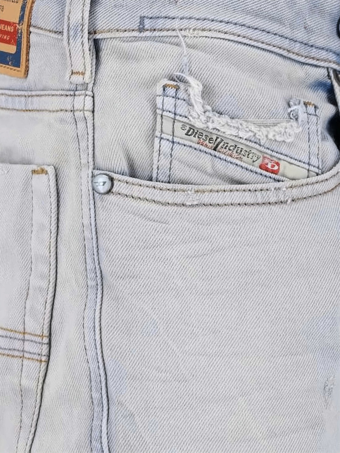 Light-Washed Denim Flared Pants with Raw Hems