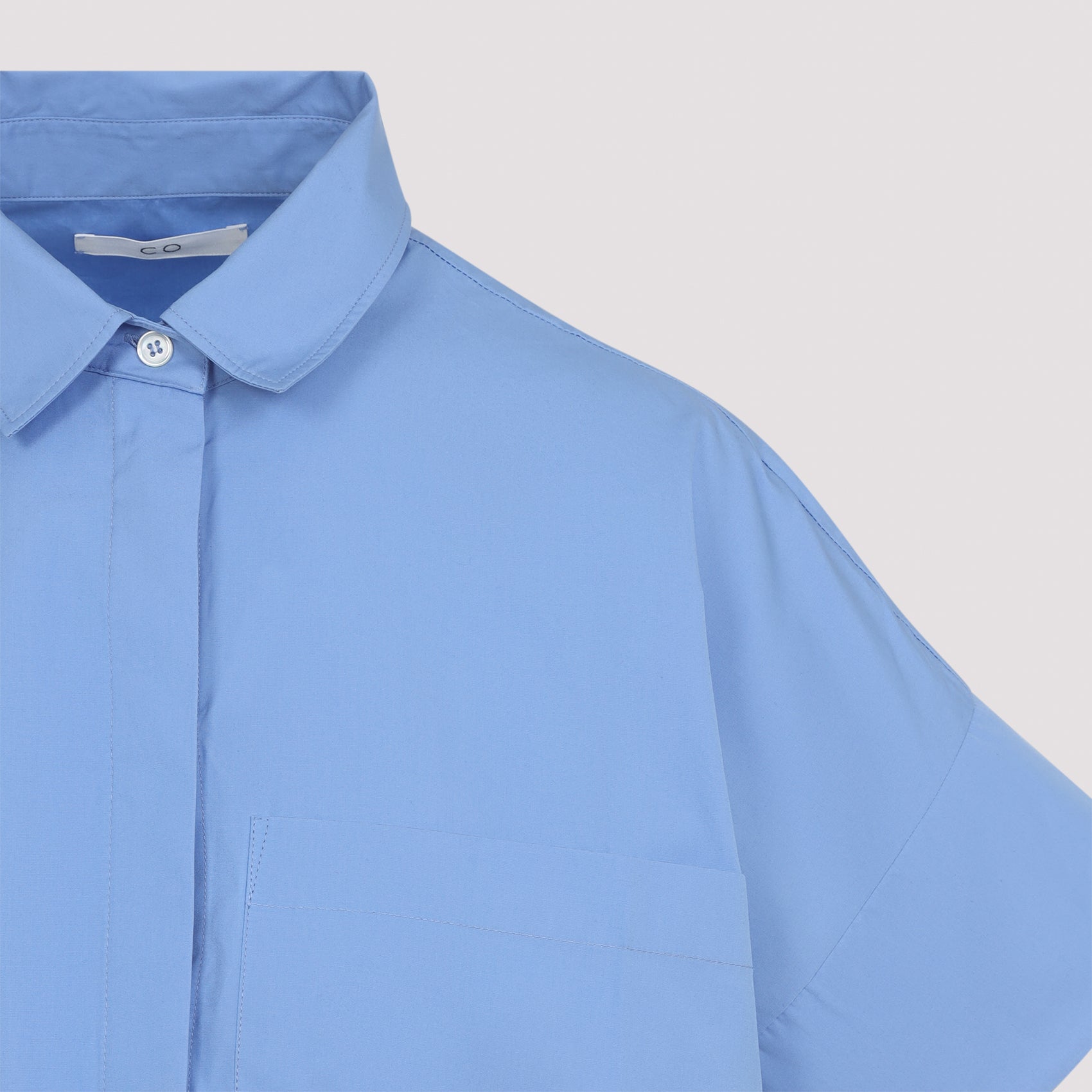 Loose-Fitting Blue Cotton Shirt with Classic Collar and Concealed Button Placket