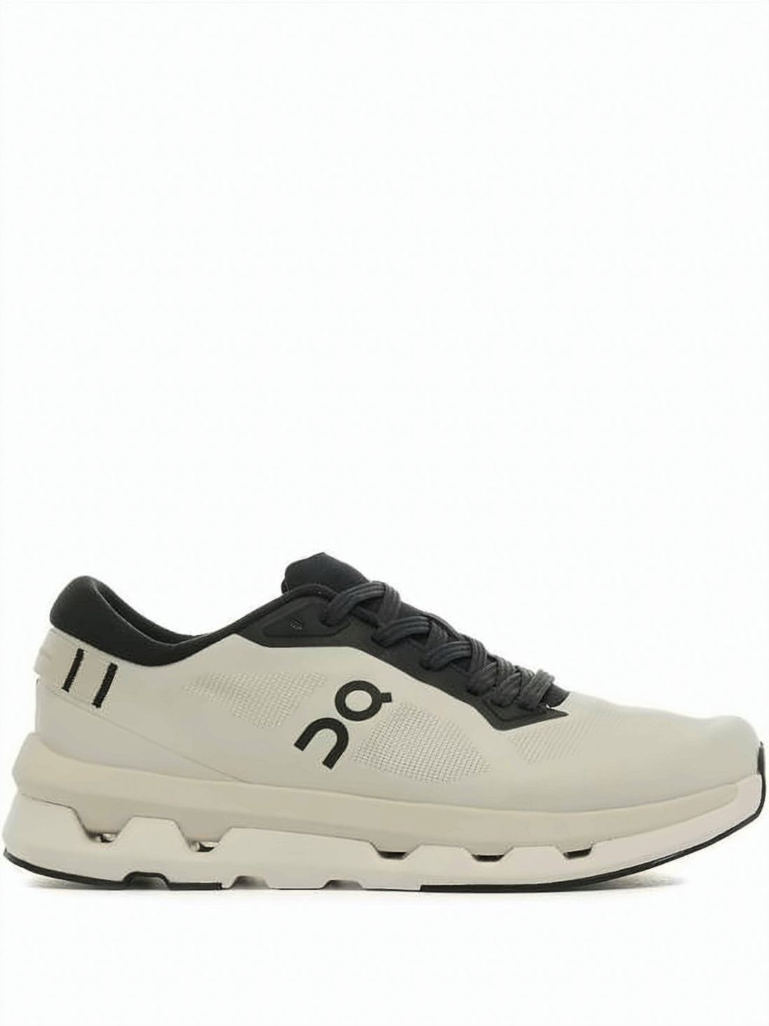 Streamlined Beige Sneakers with Black Accents