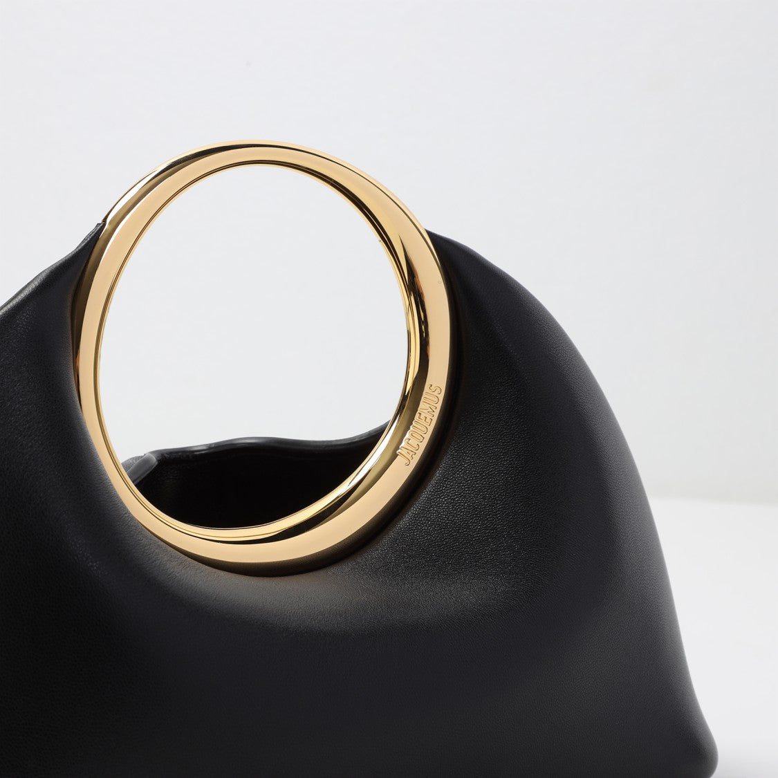 Lambskin Handbag With Circular Handle And Spacious Interior