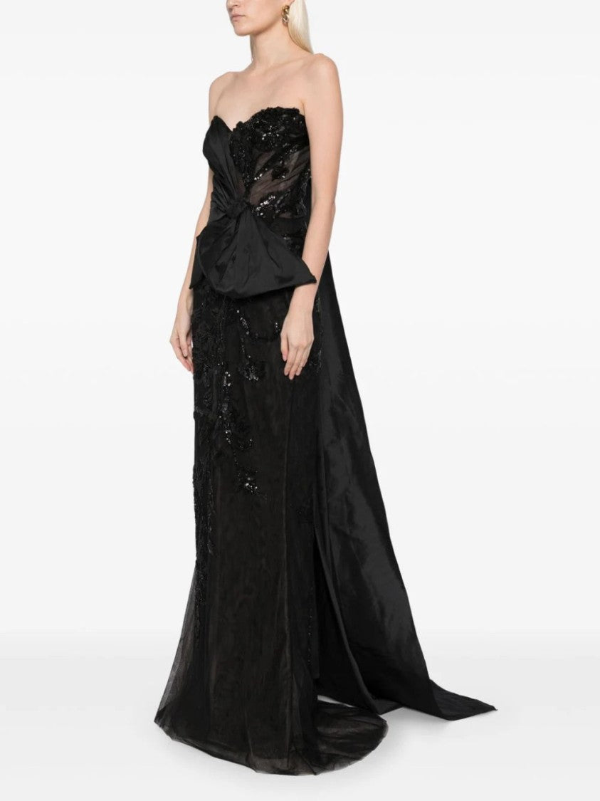Tulle Strapless, Beaded Dress With A Taffeta Draping And Tail