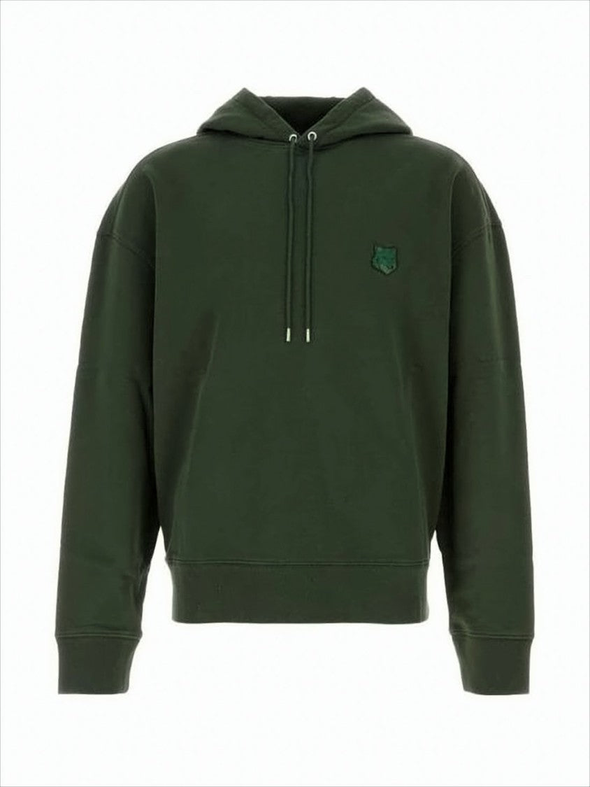 Cropped Deep Green Hoodie With Subtle Emblem And Relaxed Fit