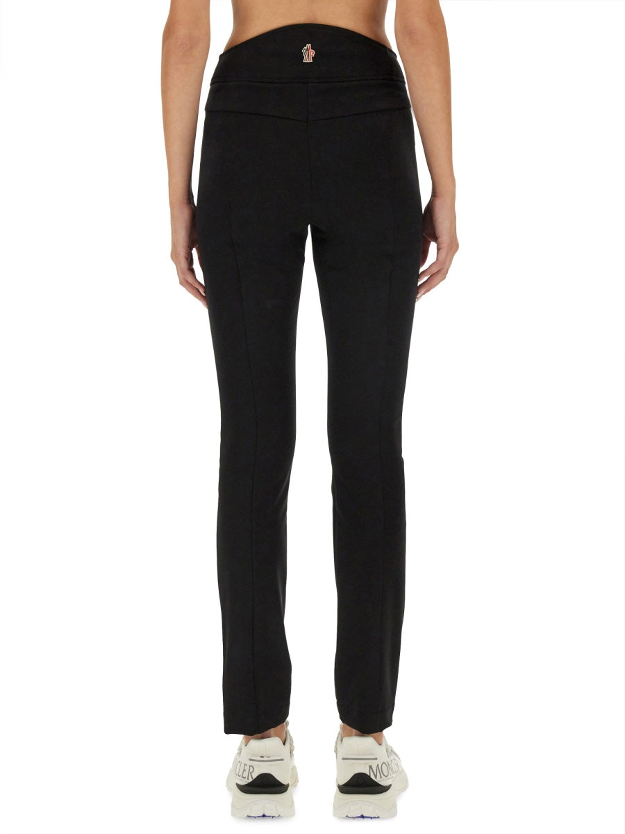 Slim Fit Pants With Logo Detail And Zippered Pockets