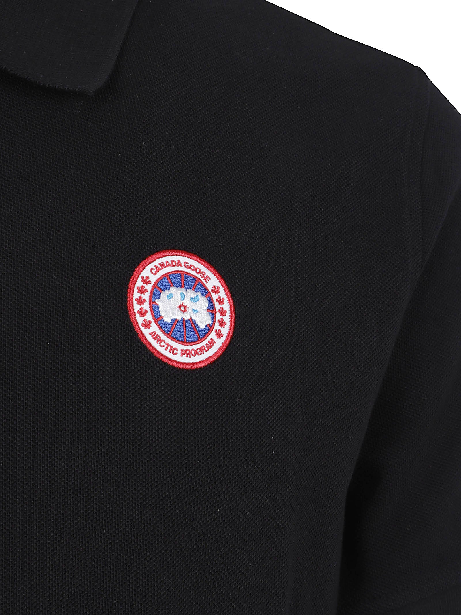 Black Polo Shirt with Ribbed Collar and Iconic Logo Patch